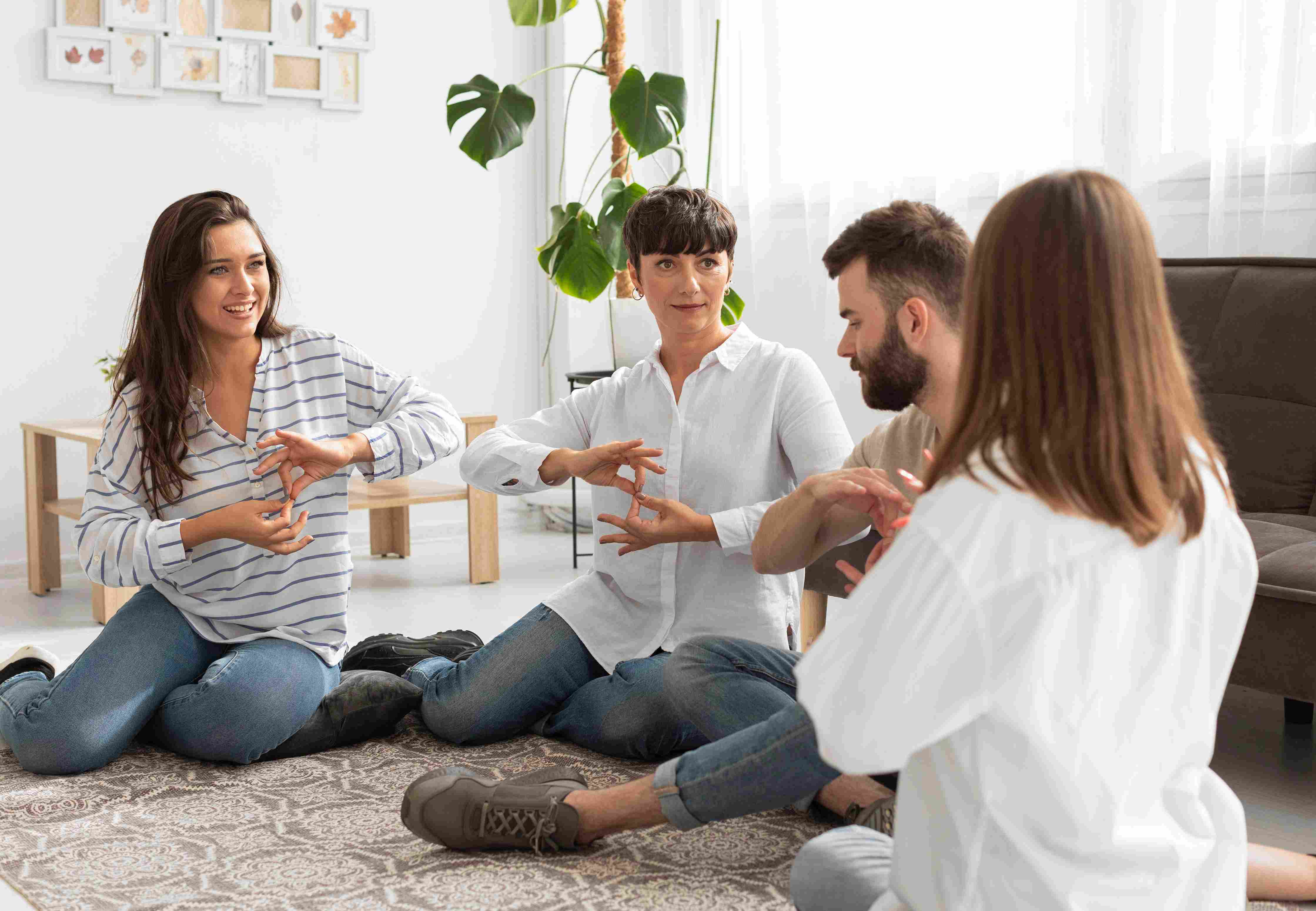 group-deaf-people-communicating-through-sign-language_11zon.jpg